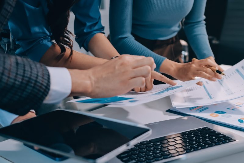 a team working out their finances together